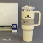 تراول ماگ استنلی Stanley Quencher مدل تامبلر رنگ کرم40oz- کد 0392