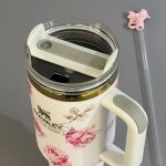 ماگ استنلی گلدار جعبه کادویی 40oz سفید صورتی (Stanley) کد 0564 - تصویر 4